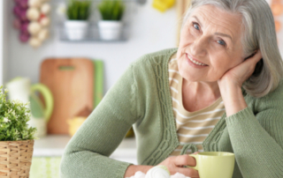 Senior woman contemplating a life insurance policy transfer